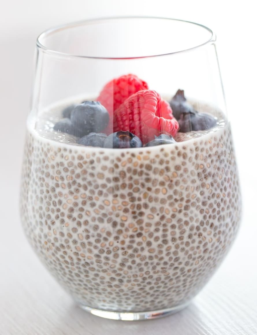Chia seed pudding with mixed berries, a fiber-rich anti-inflammatory snack rich in omega-3 fats and antioxidants.